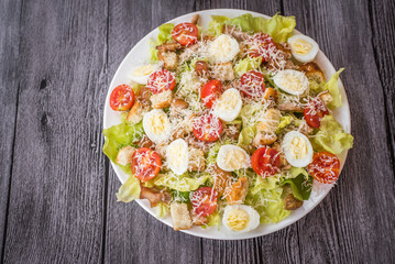 Healthy Grilled Chicken Caesar Salad with Cheese and Croutons