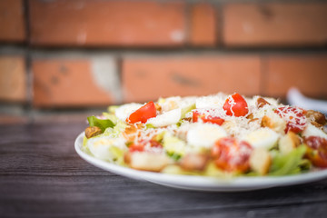 Healthy Grilled Chicken Caesar Salad with Cheese and Croutons