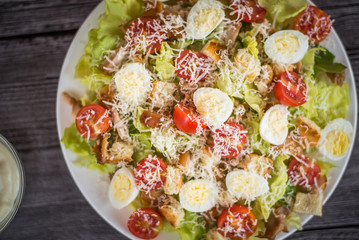 Healthy Grilled Chicken Caesar Salad with Cheese and Croutons