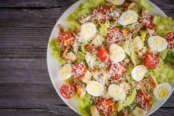 Healthy Grilled Chicken Caesar Salad with Cheese and Croutons