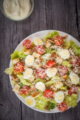 Healthy Grilled Chicken Caesar Salad with Cheese and Croutons