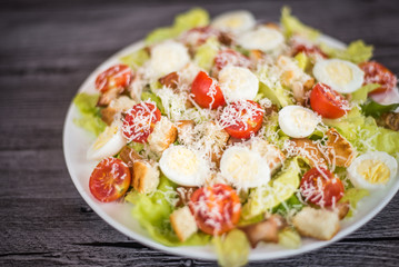 Healthy Grilled Chicken Caesar Salad with Cheese and Croutons