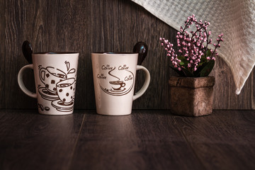 White, Brown Ceramic Coffee Mugs on Wooden Background