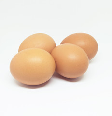 four eggs isolated on white background