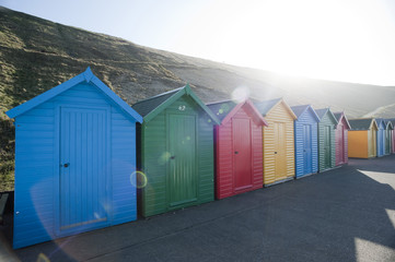 Brightly coloured beach huts