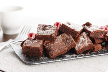 Cake chocolate brownies with raspberries