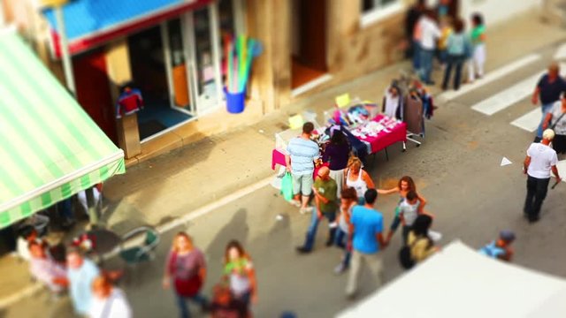 Crowd of anonymous People Shopping on a Street Market tilt shift miniature effect time lapse timelapse