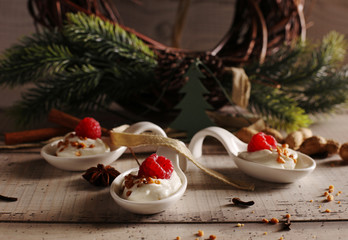 Christmas dessert: Sweet dessert with raspberry creme and christmas spice anise cinnamon
