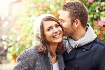 Young couple kissing in the city