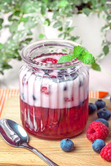 Vanilla Panna cotta with raspberry jelly.