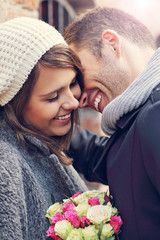 Young couple kissing in the city