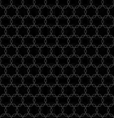 Vector monochrome seamless pattern, repeating geometric tiles, ornamental tracery texture. White shapes on black background. Dark endless texture. Design for tileable print, wallpaper, digital, web