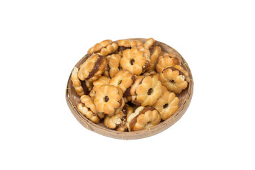 biscuits filled with pineapple jam in bamboo basket isolated on