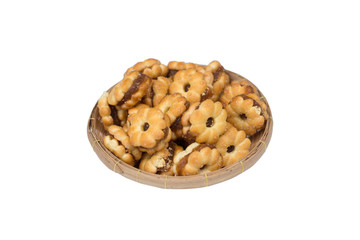 biscuits filled with pineapple jam in bamboo basket isolated on