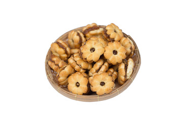 biscuits filled with pineapple jam in bamboo basket isolated on