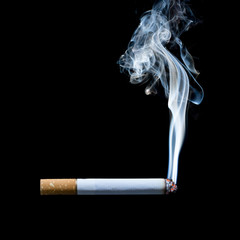 smoking cigarette on black background © Achira22