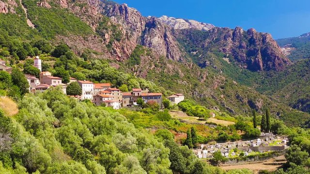 Ota town with the mountains in the background near Evisa and Porto, Corsica, France, Europe
