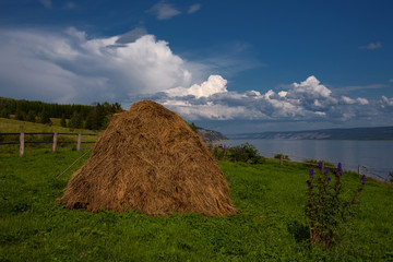 Haystack on a background of the river. Lena river. Yakutia. Russia.