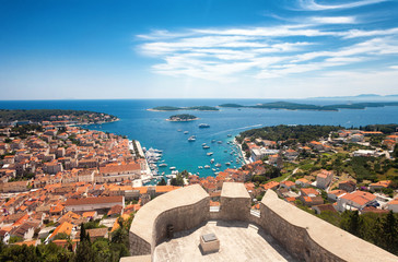 Wide angle aerial view of Hvar city and the bay from the Spanish