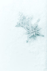 Silver Christmas Stars on a white background with snow