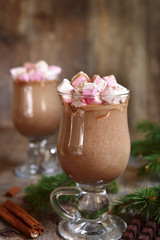 Two portions of hot chocolate in a glasses.Space for text.