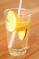 lemonade in a glass on wooden table