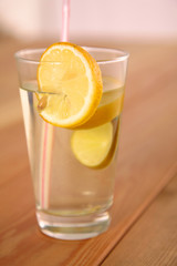 lemonade in a glass on wooden table