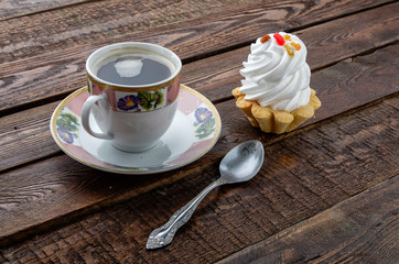 Coffee and cake on dark rustic background