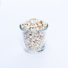 Millet rice , millet grains in bowl on white