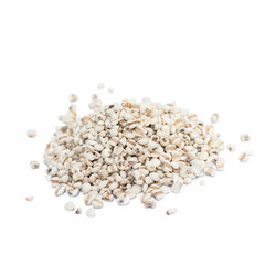 Raw millet rice in wooden spoon on white background.
