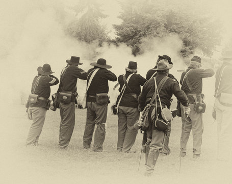 Union infantry line firing a volley.