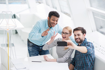 Fototapeta premium Group shot of colleagues having fun in their office