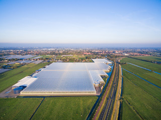 Aerial view of greenhouse in fields Netherlands - 124395583