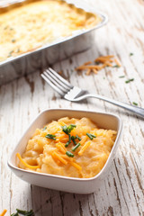 Au gratin funeral cheesy potatoes with chives and sharp cheddar cheese