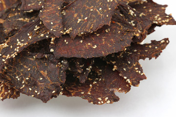 dried beef slices in spices with sesame seeds