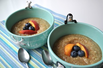 Kids meal Quinoa with fresh fruit.