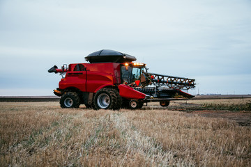 Fototapeta premium Combine in a field