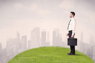 man standing in front of city landscape