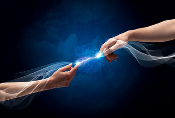 Hands connecting through fingers in space