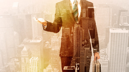 Business man looking at overlay city background