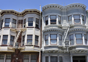 Obraz premium fire escape in San Francisco , building with windows and emerg