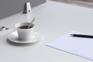 Obraz na płótnie Canvas Business concept , blank paper and cup of fresh coffee on the table in office 
