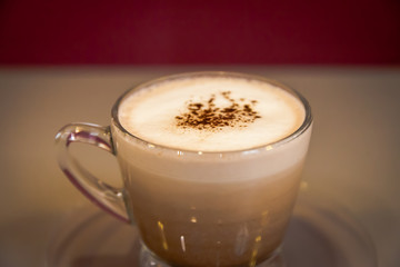 Hot drink isolated put on the table with red background at coffee shop; delicious favor chocolate and coffee.
