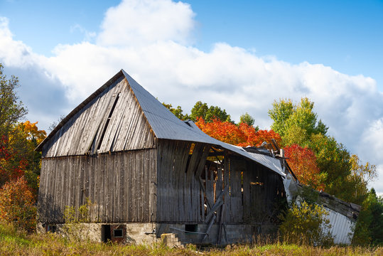 Old wooden barn in disrepair