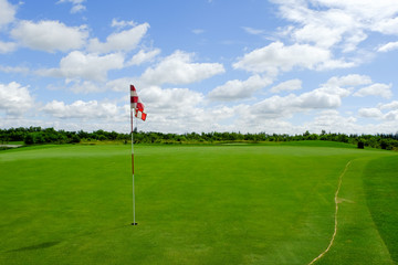 red and white checkered flag in golf course northern of thailand
