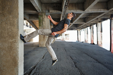 Man parkour in urban space.