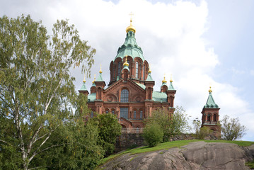 Fototapeta na wymiar Orthodox cathedral of the Dormition of the virgin (1868), cloudy august day. Helsinki, Finland