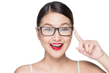 Beauty asian model girl with perfect skin wearing glasses, isola