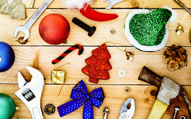 Handy Tools with Christmas decoration on wooden Background Copce