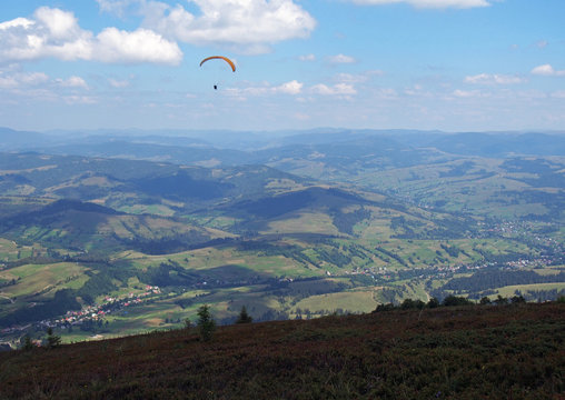 Flights on a paraplane over mountain tops